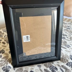 17” x 14 1/2” Black wooden portrait frame.